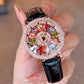 Women's Rotating Dial Watch with Colored Simulated Diamonds