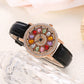 Women's Rotating Dial Watch with Colored Simulated Diamonds