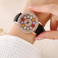 Women's Rotating Dial Watch with Colored Simulated Diamonds