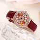 Women's Rotating Dial Watch with Colored Simulated Diamonds