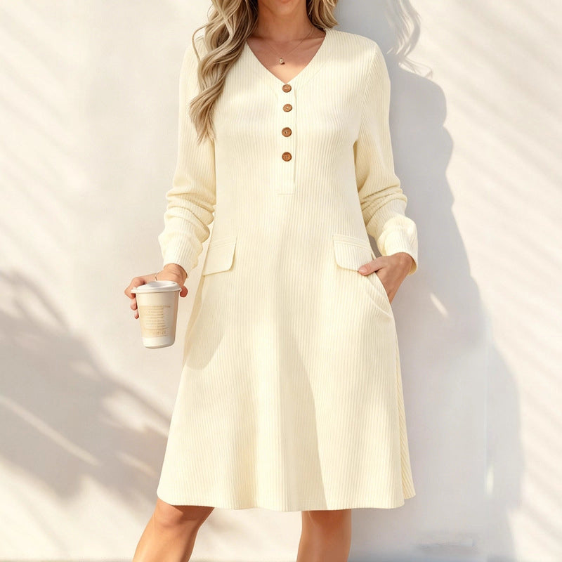 A Lovely V-Neck Ribbed Knit Dress with a Flattering A-Line Shape and Just the Right Touch of Elegance