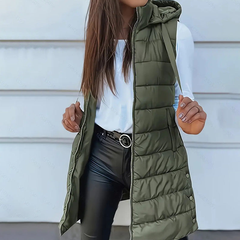 🧥 Stay Warm Without the Bulky Sleeves! ❄️ Women's Long Hooded Quilted Puffer Vest – Cozy Padded Design, Full-Zip Front, Practical Pockets & Extra Longline Coverage for Effortless Fall & Winter Layering! 💕