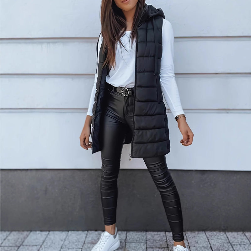 🧥 Stay Warm Without the Bulky Sleeves! ❄️ Women's Long Hooded Quilted Puffer Vest – Cozy Padded Design, Full-Zip Front, Practical Pockets & Extra Longline Coverage for Effortless Fall & Winter Layering! 💕