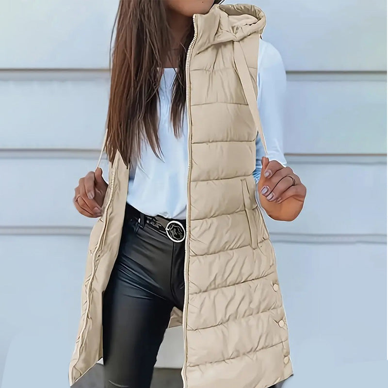 🧥 Stay Warm Without the Bulky Sleeves! ❄️ Women's Long Hooded Quilted Puffer Vest – Cozy Padded Design, Full-Zip Front, Practical Pockets & Extra Longline Coverage for Effortless Fall & Winter Layering! 💕