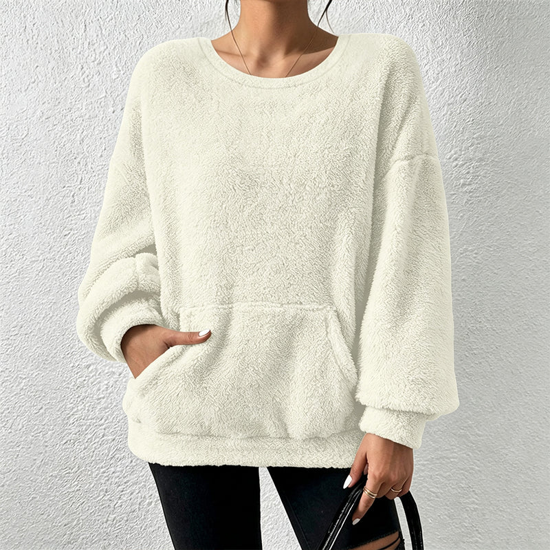 A Soft Plush-Lined Sweatshirt Designed for Warmth, Comfort, and Everyday Winter Wear