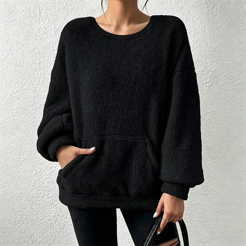 A Soft Plush-Lined Sweatshirt Designed for Warmth, Comfort, and Everyday Winter Wear